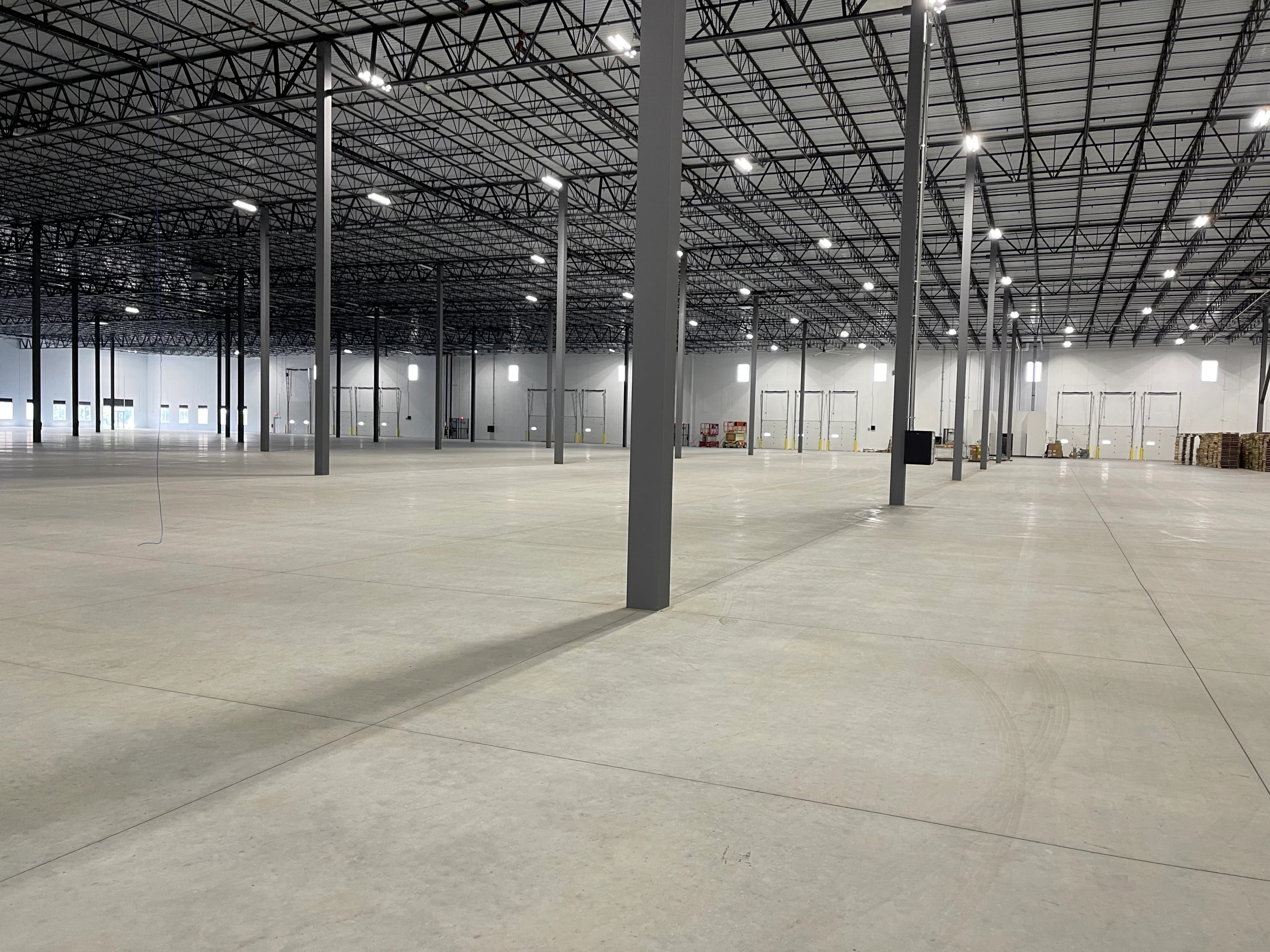 Walk-in refrigeration equipment maintained in a distribution center