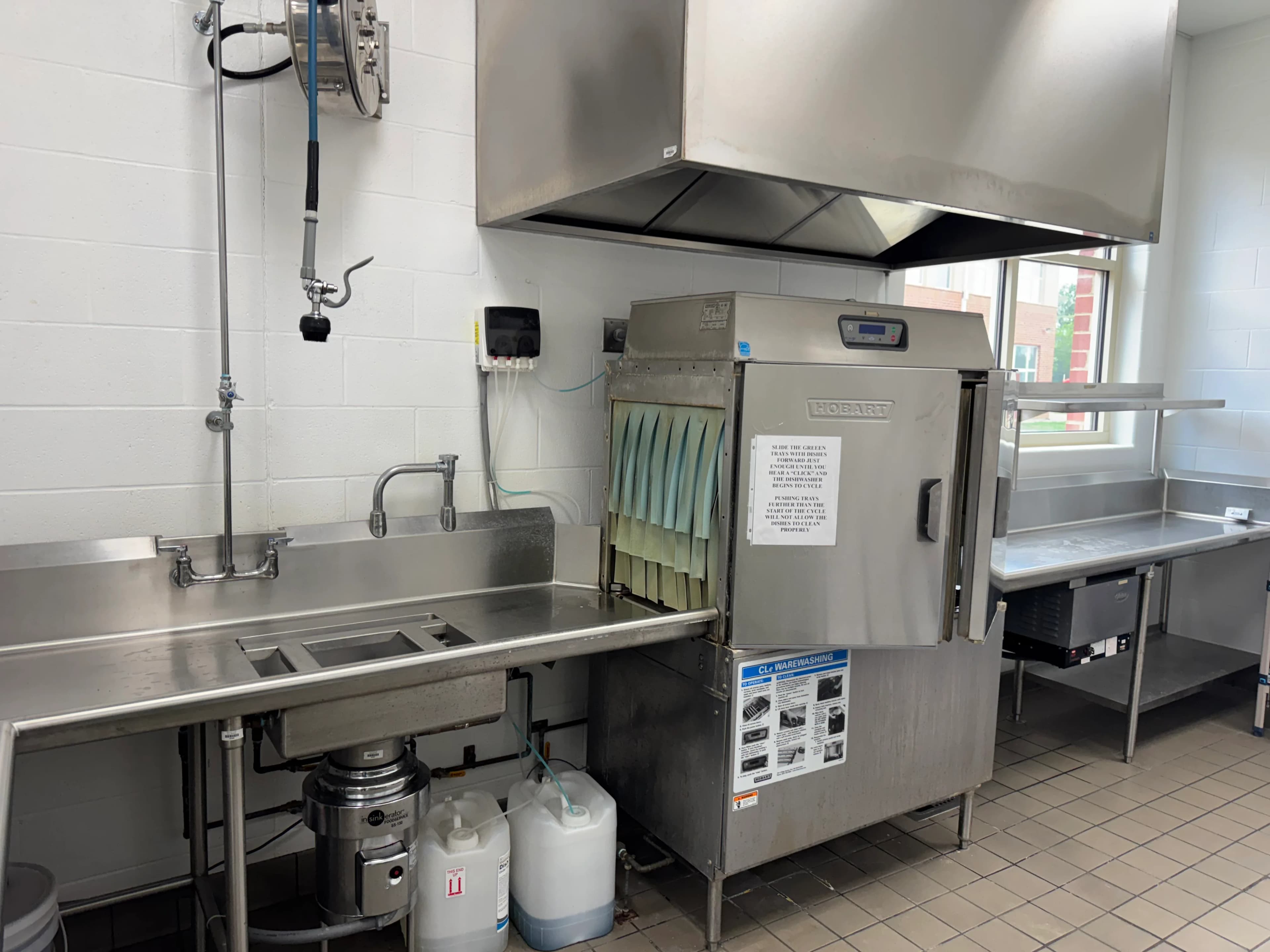 A new stainless cooking suite and serving line installed in a school district kitchen