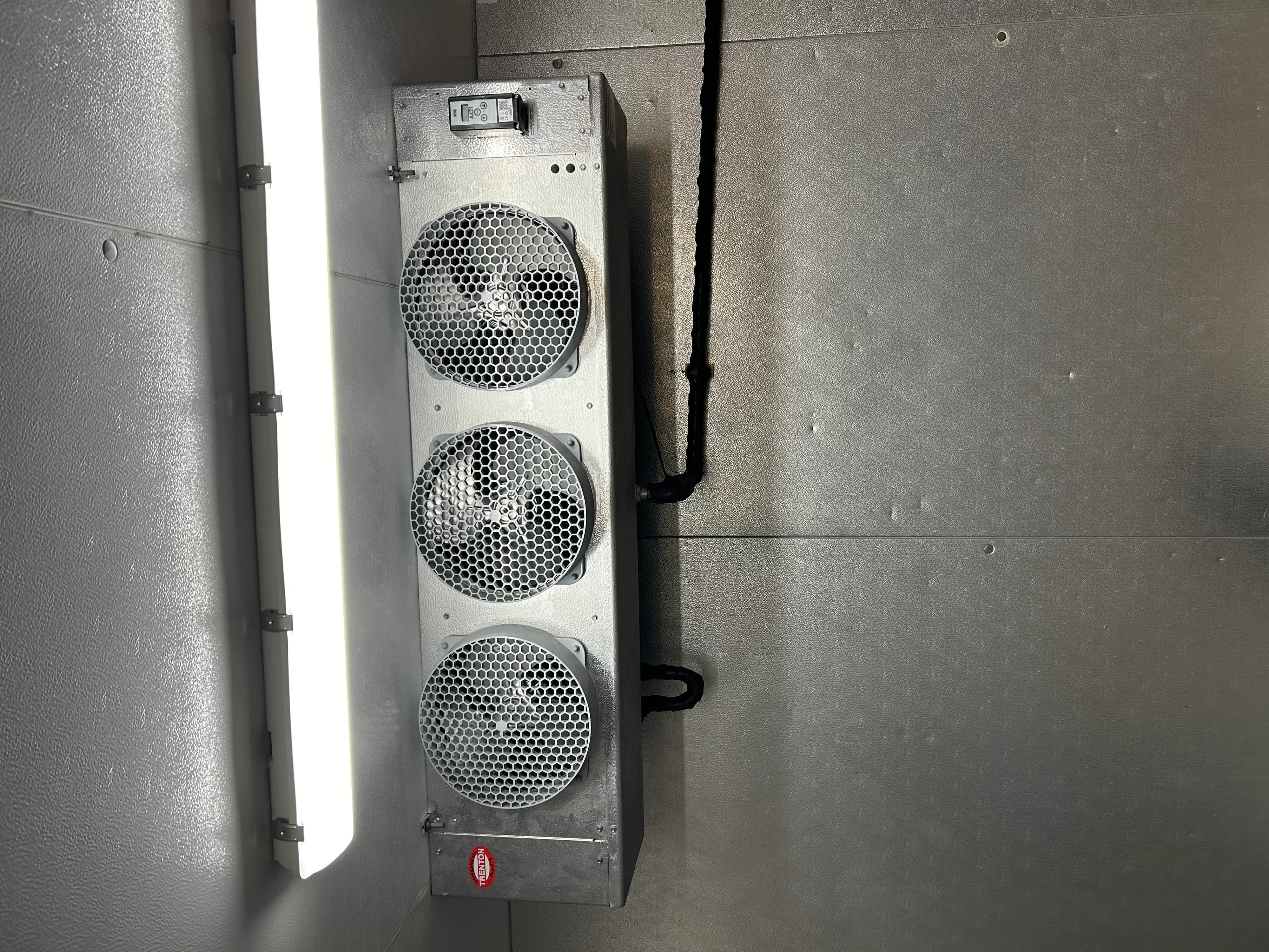 Warewashing and hot-holding equipment serviced in a school kitchen